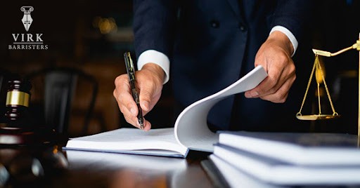 criminal defence lawyer reading documents