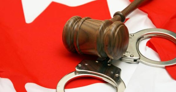 gavel on the Canadian flag